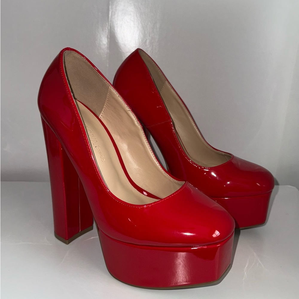 Fashion Nova red platform heels size 7.5
only worn twice